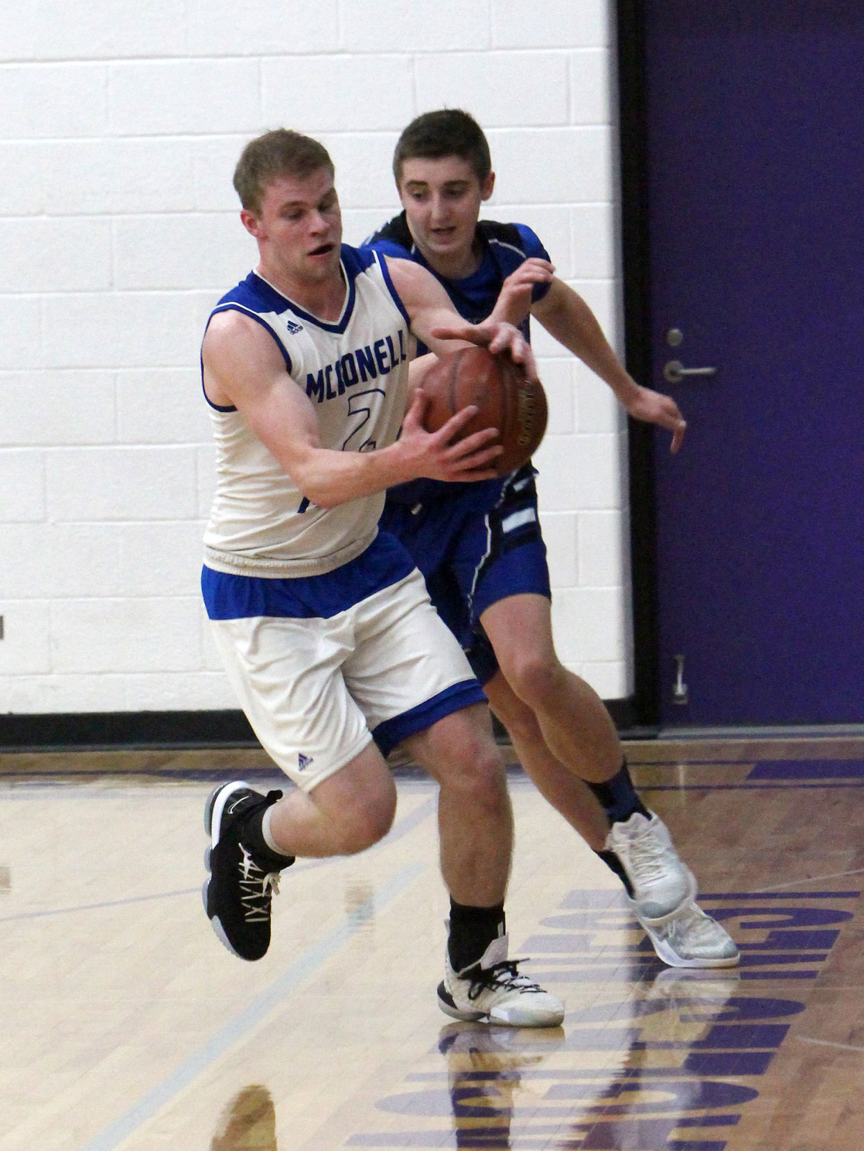Athens vs McDonell boys basketball at Eau Claire Memorial 3-7-19